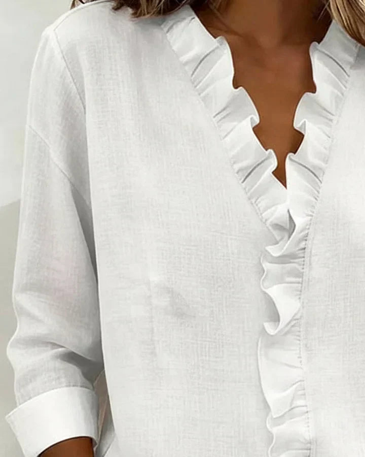 Clara | Blusa con cuello en V y volantes